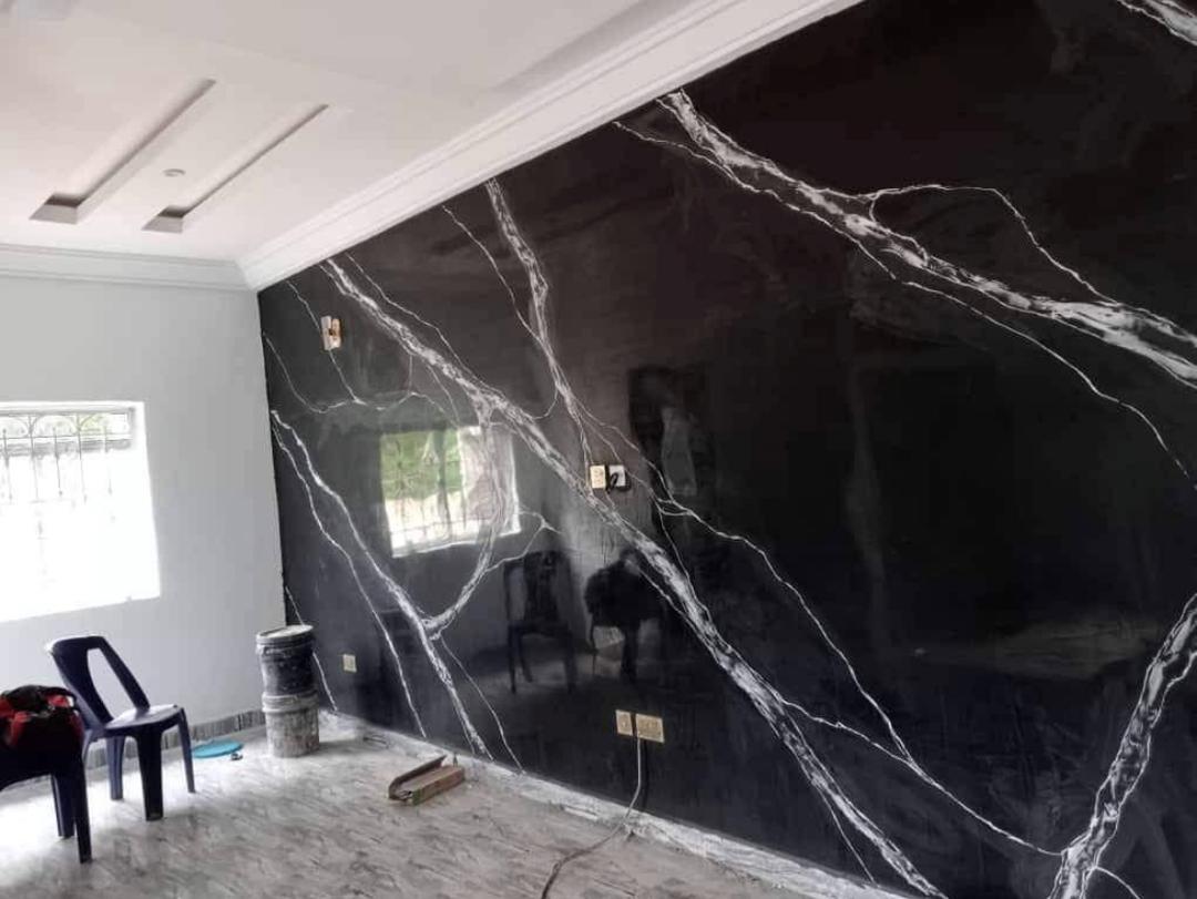 Stucco design wall finish by Ajis Interior Creations