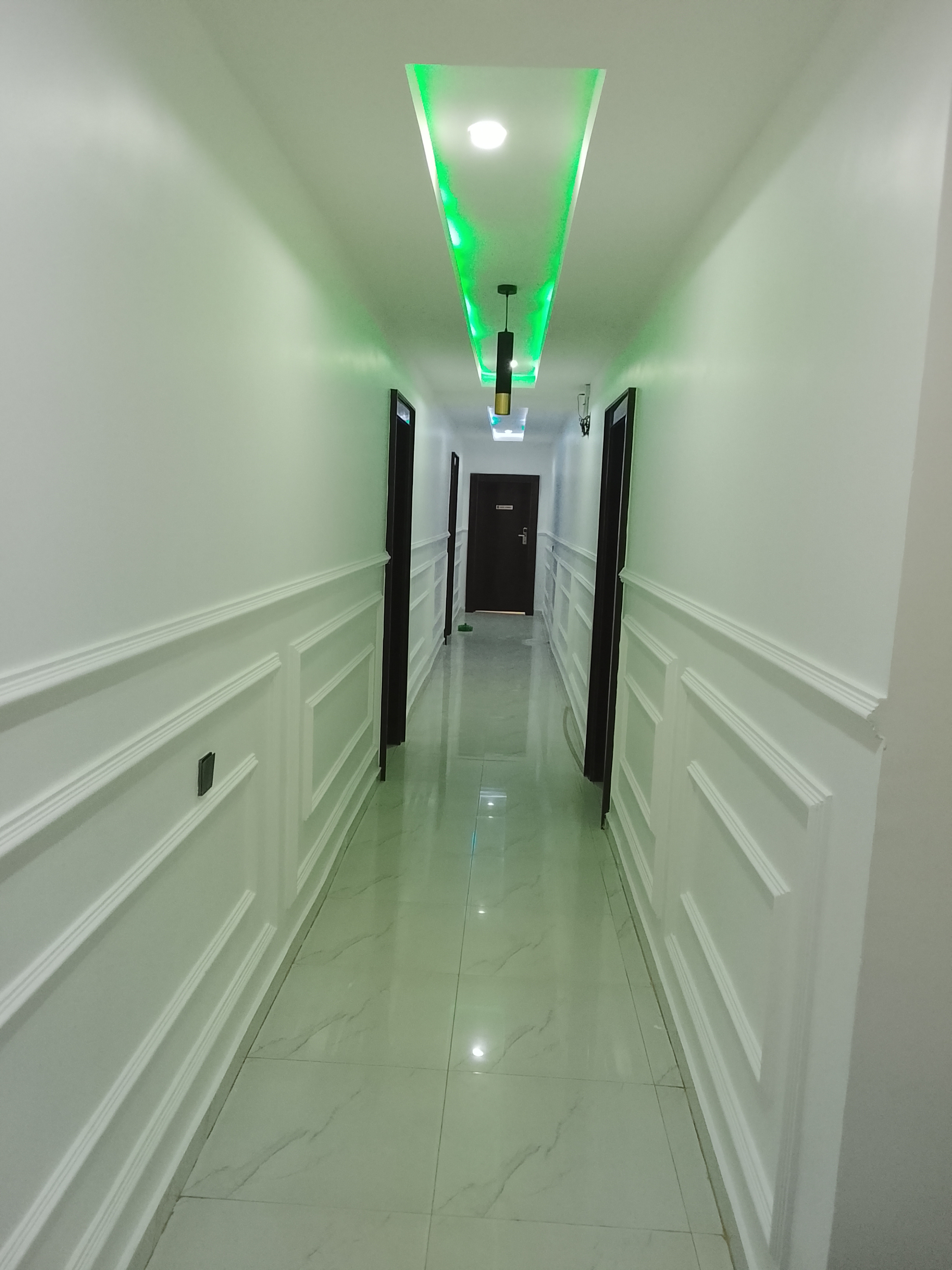 Interior painting by Ajis Interior Creations: freshly painted hallway walls