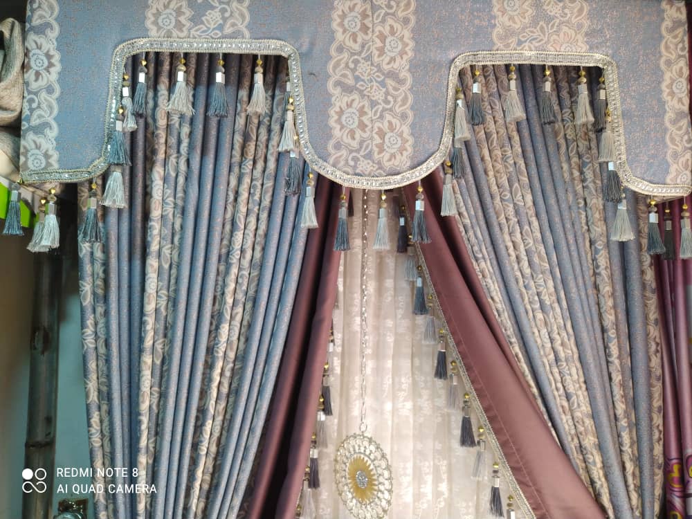 Curtain installation by Ajis Interior Creations
